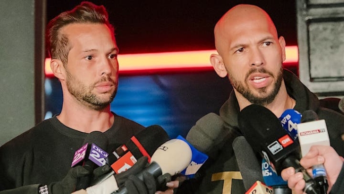 Tristan Tate and Andrew Tate face rape and sex trafficking charges in multiple countries and the United Kingdom is seeking their extradition. (Andrei Pungovschi/Getty Images)