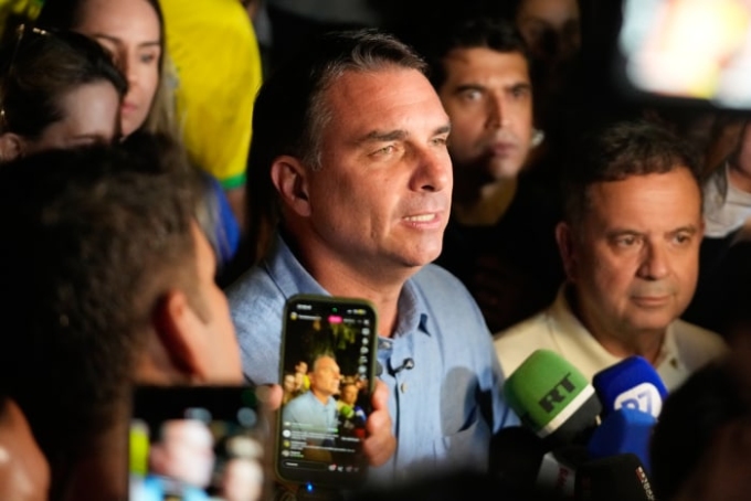 Flavio Bolsonaro advanced to a runoff following the first round of the presidential election in Brazil. Eraldo Peres/AP
