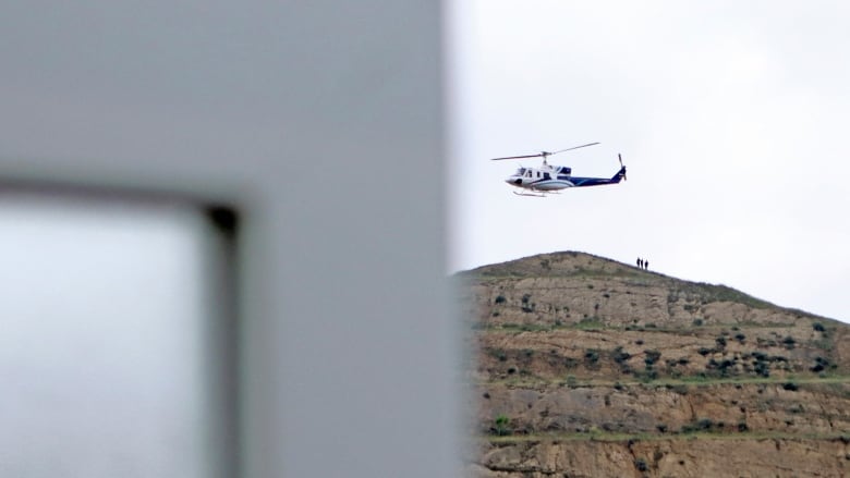 Iranian president still missing as rescue crews search mountainous region for his helicopter
