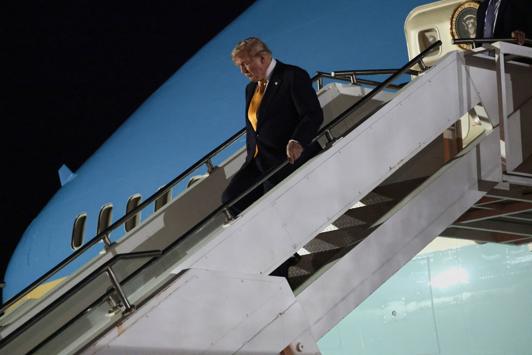 Trump hid in catering truck in secret plane swap over Iran threat, reports say