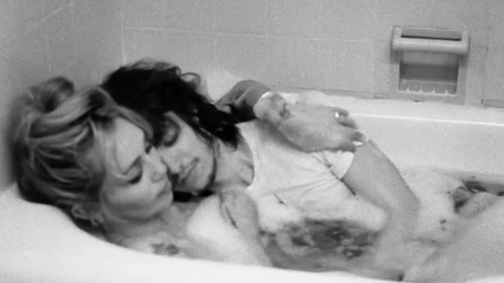 Miley strips down with fiance in new clip
