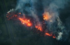 Full screen 1/51 SLIDES © Bruce Omori/ParadiseHelicopters/EPA-EFE/Rex/Shutterstock A 2,000 foot long fissure erupts within the Leilani Estates subdivision, on the east rift zone of the Kilauea volcano, igniting a home, a