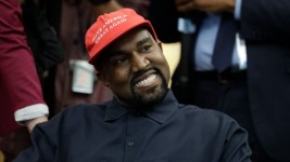 Rapper Kanye West wears a Make America Great again hat during a meeting with President Donald Trump in the Oval Office of the White House on Oct. 11, 2018. (Evan Vucci/The Associated Press)