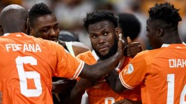 Ivory Coast extended their perfect record against Senegal at the Afcon finals to three wins as they reached the quarter-finals in dramatic fashion