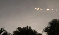 Flames shoot out of plane mid-air forcing emergency landing in Miami – video