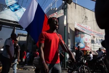 A man protests in Port-au-Prince, Haiti, on Thursday, demanding the resignation of Haitian Prime Minister Ariel Henry. (Anadolu/Getty Images)