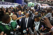 Jacob Zuma, center, being greeted by members of his new political party as he arrives at the vote tallying center in Midrand, South Africa, on Saturday.Credit...Phill Magakoe/Agence France-Presse — Getty Images