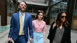 Knox arriving at the Florence court with her husband on Wednesday. Tiziana Fabi/AFP/Getty Images