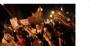 People protest against Israeli Prime Minister Benjamin Netanyahus government and also call for the release of hostages held in the Gaza Strip by the Hamas militant group in Tel Aviv Israel on Saturday. Leo Correa/The Associated Press