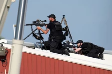 Police snipers return fire after shots were fired while Republican presidential candidate former President Donald Trump was speaking at a campaign event in Butler, Pa., on Saturday, July 13, 2024 Gene J. Puskar/AP