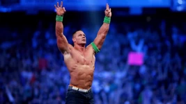 John Cena celebrates his win during Wrestlemania in New Orleans April 6, 2014. (Jonathan Bachman/AP Images for WWE, File)