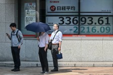 Stocks in Japan fell hard on Monday for a third straight day.Credit...Richard A. Brooks/Agence France-Presse — Getty Images