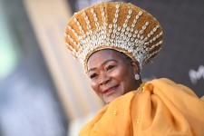 Connie Chiume during the world premiere of “Black Panther: Wakanda Forever” in Hollywood in 2022. She played an honored elder of a mining tribe in a fictional African kingdom.Credit...Valerie Macon/Agence France-Presse — Getty Images