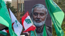 A portrait of slain Hamas leader Ismail Haniyeh is displayed during a demonstration denouncing his killing. Picture: Mahmoud Zayyat/AFP