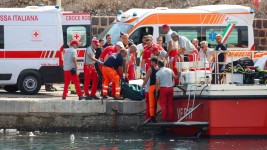 One person was killed and rescuers were searching for six others missing after a superyacht with 22 people aboard sank during a sudden storm off the coast of Italy's Sicily. (Photo by Igor Petyx / ANSA / AFP)