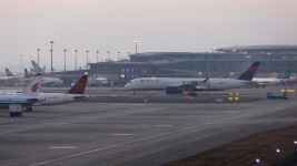 A Delta Airlines flight arrives at Shanghai Pudong International Airport on January 8, 2023 in Shanghai, China. Yin Liqin/China News Service/VCG/Getty Images