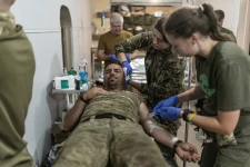 Ukrainian army medics treat wounded soldiers at a stabilization point in the Pokrovsk direction. Diego Herrera Carcedo/Anadolu/Getty Images