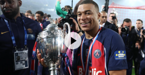 Paris Saint-Germain's forward Kylian Mbappé celebrates with the trophy after his team's victory in the French Cup Final f on May 25, 2024. © Franck Fife, AFP