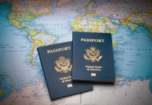 U.S. passports on a map of the world. Maudib, Getty Images/iStockphoto