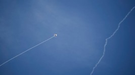 Israel's Iron Dome air defence system fires to intercept a rocket fired from Lebanon, in northern Israel on Friday. (Leo Correa/The Associated Press)