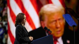 Donald Trump is looming large over Kamala Harris’ campaign. (Photo by DUSTIN FRANZ / AFP)