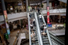 Shoppers wear protective face masks at Azrieli Mall in Tel Aviv after it reopened to the public, as prior restrictions for preventing the spread of the novel coronavirus were eased, on May 19, 2020Miriam Alster / Flash90