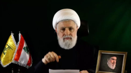 An image grab taken from Hezbollah's Al-Manar TV shows the group's deputy chief Naim Qassem delivering a speech from an undisclosed location on October 15, 2024. © AFP