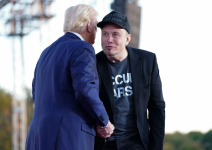 Elon Musk speaks with former president Donald Trump during a campaign event Oct. 5 in Butler, Pennsylvania. (Jabin Botsford/The Washington Post)