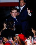 Barron Trump, the son of Donald and Melania Trump, gives a thumbs-up at a campaign rally at a Trump golf resort in Doral, Fla., July 9. MARCO BELLO/REUTERS