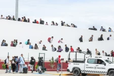 Asylum-seekers are led to their interviews with US border agents at the San Ysidro crossing near San Diego.Photographer: Robert Gauthier/Los Angeles Times/Getty Images