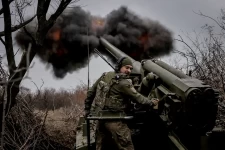 A serviceman of 24th Mechanized Brigade of the Ukrainian Armed Forces fires a 2s5 "Hyacinth-s" self-propelled howitzer towards Russian troops at a front line. Ukrainian Armed Forces/Reuters