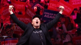 Tesla and X CEO Elon Musk takes the stage during a campaign rally for Republican presidential nominee former US President Donald Trump at Madison Square Garden on October 27 2024 in New York City. ©  Michael M. Santiago / Getty Images