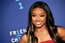 Simone Biles is set to appear on "The Voice" in a playoff advisor. Unique Nicole, Getty Images