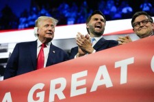 Former President Donald Trump appears with Republican vice president nominee JD Vance and Speaker of the House Mike Johnson during the first day of the Republican National Convention on July 15, 2024, in Milwaukee, Wisconsin. Mike De Sisti, Milwaukee Jour