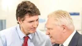 Prime Minister Justin Trudeau and Ontario Premier Doug Ford attend an announcement at Seneca College in King City, Ont., on Feb. 9, 2024. Ford has written to Trudeau on behalf of all premiers asking for a meeting about the Canada-U.S. relationship.