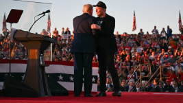 Tesla CEO Elon Musk joins former President and Republican presidential candidate Donald Trump during a campaign rally at site of his first assassination attempt in Butler, Pa., October 5, 2024 Jim Watson/AFP via Getty Images