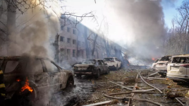 A view shows cars and a building heavily damaged during a Russian missile strike, amid Russia's attack on Ukraine, in Odesa, Ukraine on November 18, 2024. © State Emergency Service of Ukraine, via Reuters