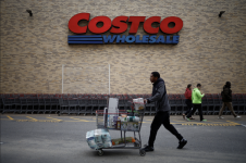 A shopper pushes a shopping cart at a Costco store ahead of Black Friday in Arlington, Virginia, on Wednesday. Photograph: Benoît Tessier/Reuters