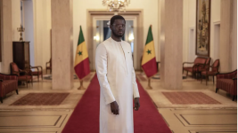 Senegal’s President Bassirou Diomaye Faye poses for a portrait inside the Presidential Palace in Dakar on November 28, 2024. © John Wessels, AFP