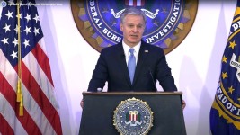 FBI Director Christopher Wray speaks on Dec. 11, 2024, in Washington, D.C., announcing he will resign his post at the end of the current administration. FBI