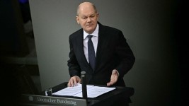 German Chancellor Olaf Scholz addresses the lower house of Germany's parliament in Berlin on December 16, 2024, ahead of the no-confidence vote. Tobias Schwarz/AFP/Getty Images