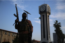 Rebels celebrate the takeover of Damascus, in Homs, Syria, on Sunday. (Bilal Al Hammoud/EPA-EFE/Shutterstock)