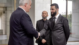 Syria's new leader Ahmed al-Sharaa welcomes Ukrainian Foreign Minister Andrii Sybiha in Damascus on December 30, 2024. © Bakr Alkasem, AFP