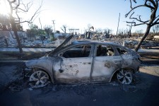 Remains of a Tesla electric car, destroyed by the Palisades Fire are seen, at the Pacific Palisades neighborhood in Los Angeles, California, U.S. January 13, 2025. REUTERS/Mike Blake