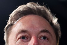 Elon Musk has no compunction about lambasting serving administrations and throwing his weight behind opposition movements on the populist right. | POOL photo by Toby Melville/AFP via Getty Images