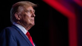 Donald Trump stands onstage at a forum in Nashville on February 22, 2024.  Jon Cherry/Getty Images