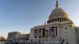 Flags on the US Capitol during a rehearsal ahead of the 60th presidential inauguration in Washington, DC, US, on Sunday, Jan. 12, 2025.  Al Drago/Bloomberg via Getty Images