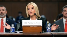 Pam Bondi, President-elect Trump's choice to lead the Justice Department as attorney general, appears before the Senate Judiciary Committee for her confirmation hearing at the Capitol on Jan. 15, 2025. (AP Photo/Ben Curtis)