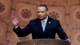 Dan Bongino, pictured, has hosted Trump on his daily podcast, and has regularly promoted the president while frequently attacking ‘libs’ and former leader Joe Biden © Susan Walsh/AP