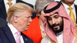 President Donald Trump speaks with Saudi Arabia's Crown Prince Mohammed bin Salman during family photo session with other leaders and attendees at the G20 leaders summit in Osaka, Japan, June 28, 2019.  Kevin Lamarque/Reuters